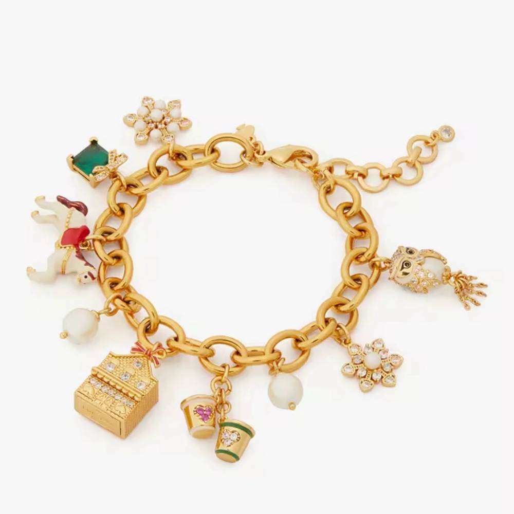 Amazing Kate Spade charm bracelet. Charms commemorate recent specialty items.